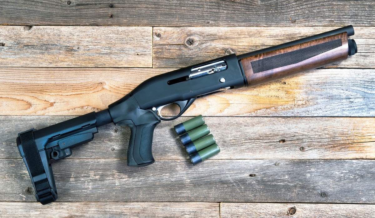 shotgun-for-home-defense-on-a-wooden-top.jpg