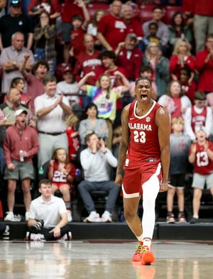 Mar 9, 2024; Tuscaloosa, Alabama, USA; Alabama forward Nick Pringle (23) reacts as Alabama makes a comeback during the second half against Arkansas at Coleman Coliseum. Alabama came from behind to win on overtime 92-88. Mandatory Credit: Gary Cosby Jr.-USA TODAY Sports